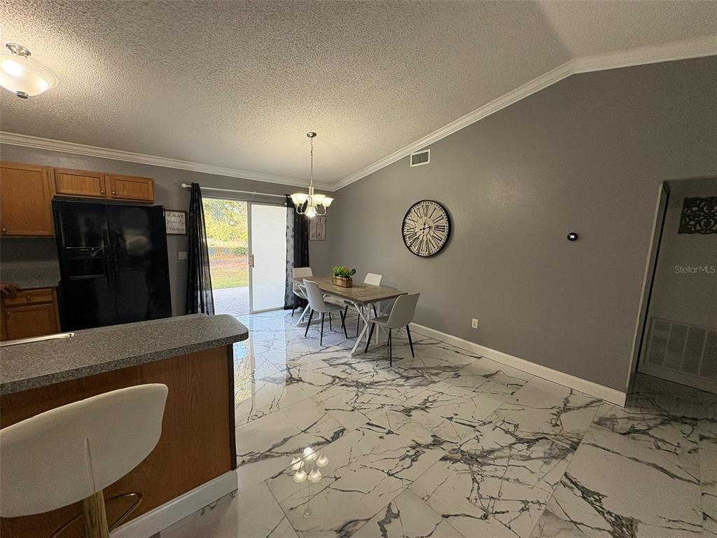 3123 East Marcia Street Inverness, FL 34453 - Photo 9 of 32 a living room with a couch and a view of living room