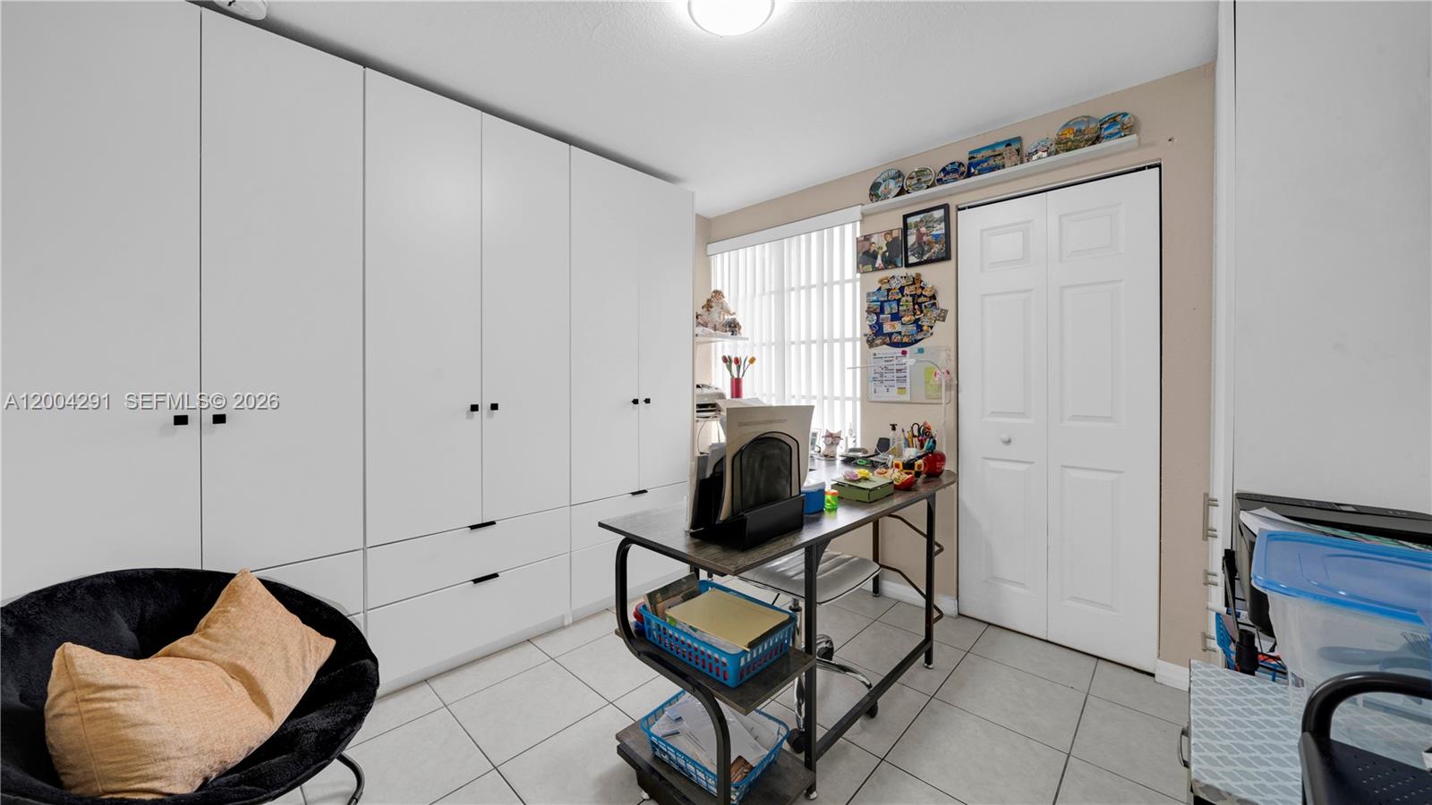 120 East 5th Street, Unit 2 Hialeah, FL 33010 - Photo 17 of 42 a room with furniture and air conditioner