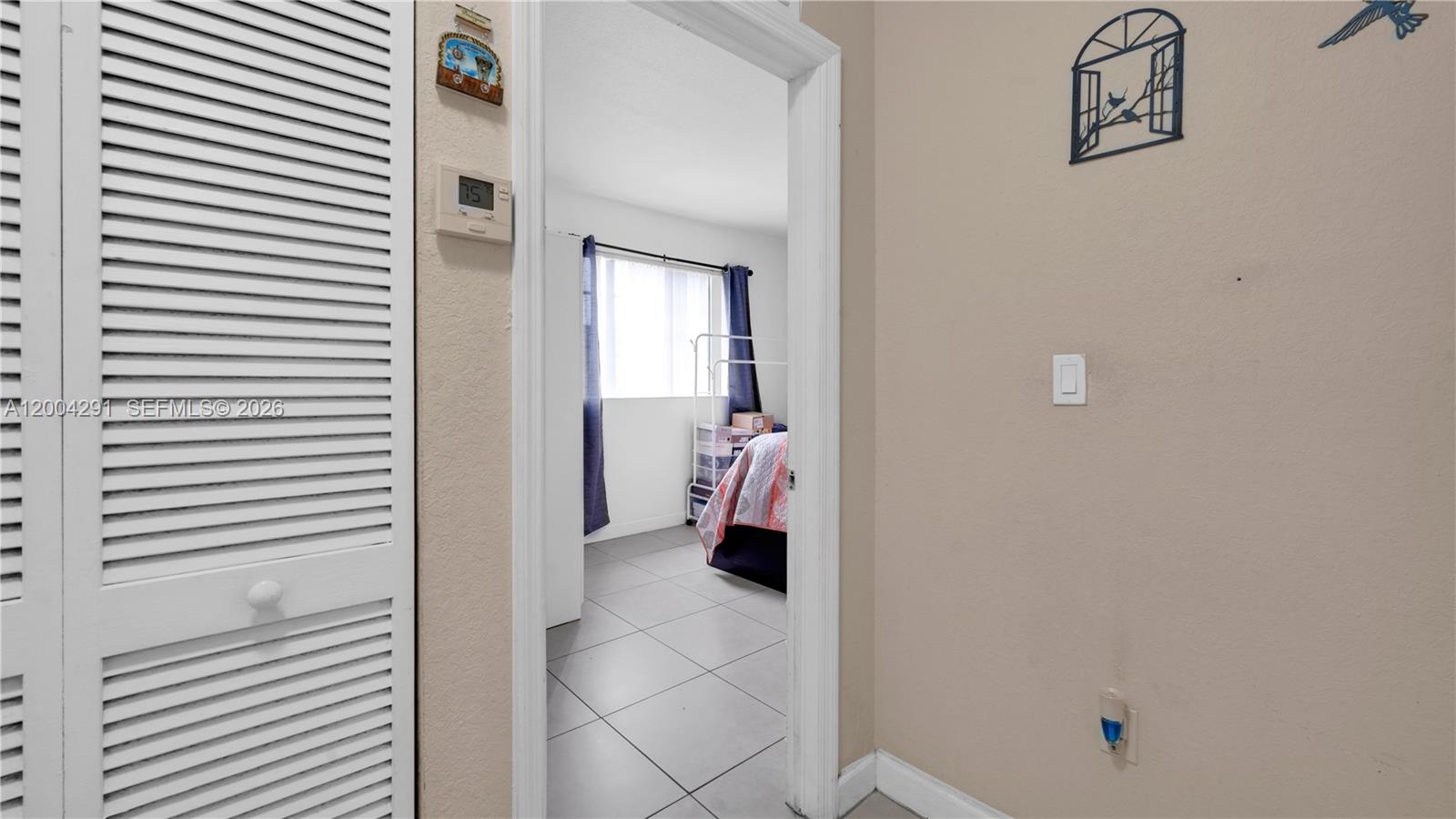 120 East 5th Street, Unit 2 Hialeah, FL 33010 - Photo 23 of 42 a view of a hallway with workspace and a window