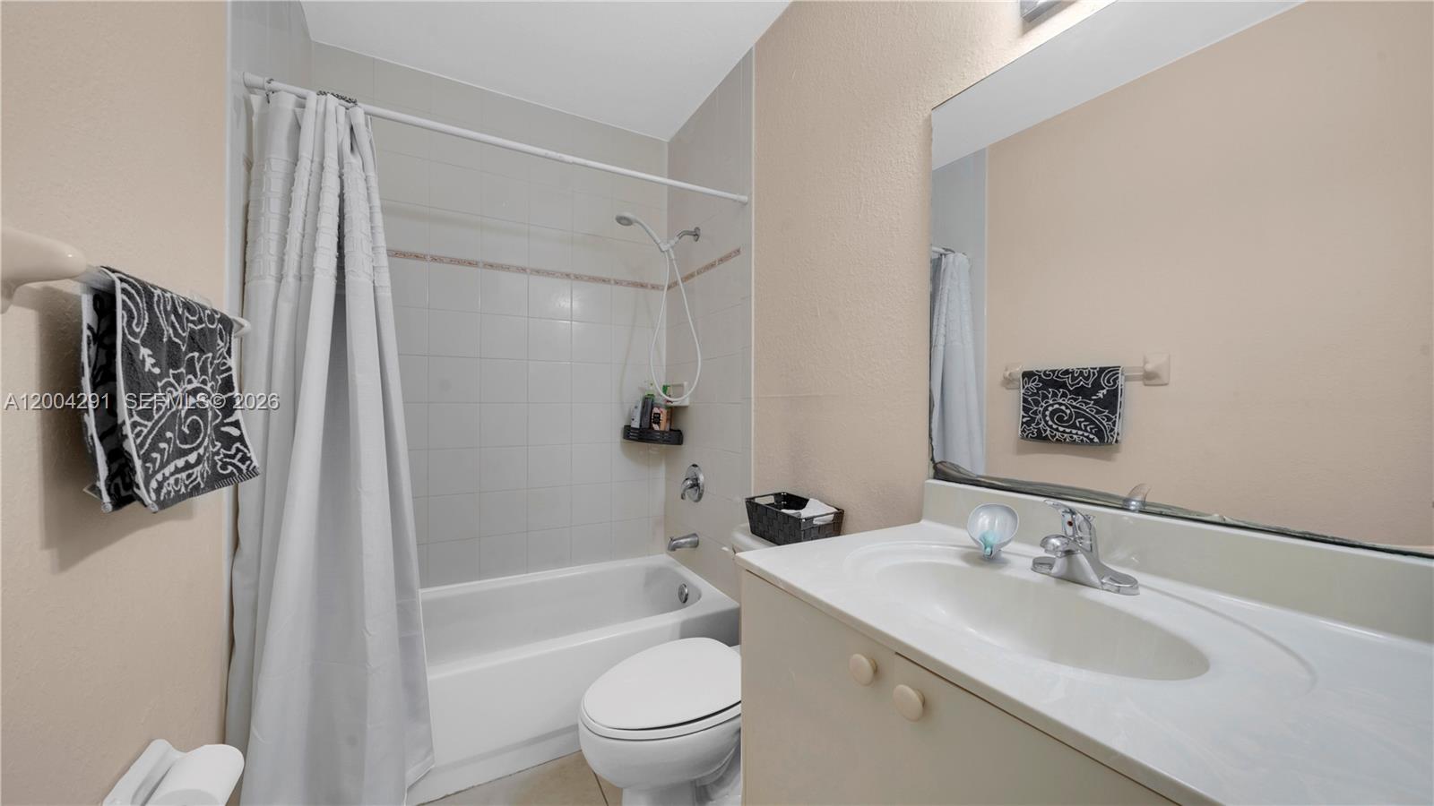 120 East 5th Street, Unit 2 Hialeah, FL 33010 - Photo 28 of 42 a bathroom with a sink toilet and shower