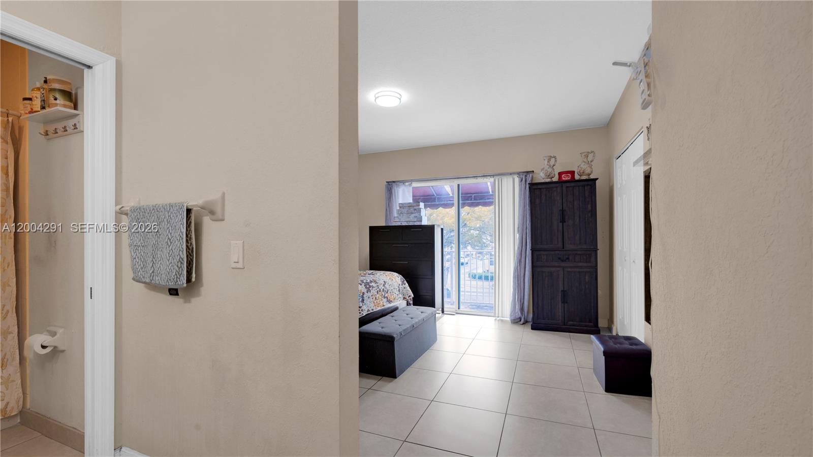 120 East 5th Street, Unit 2 Hialeah, FL 33010 - Photo 30 of 42 a walk in closet with window