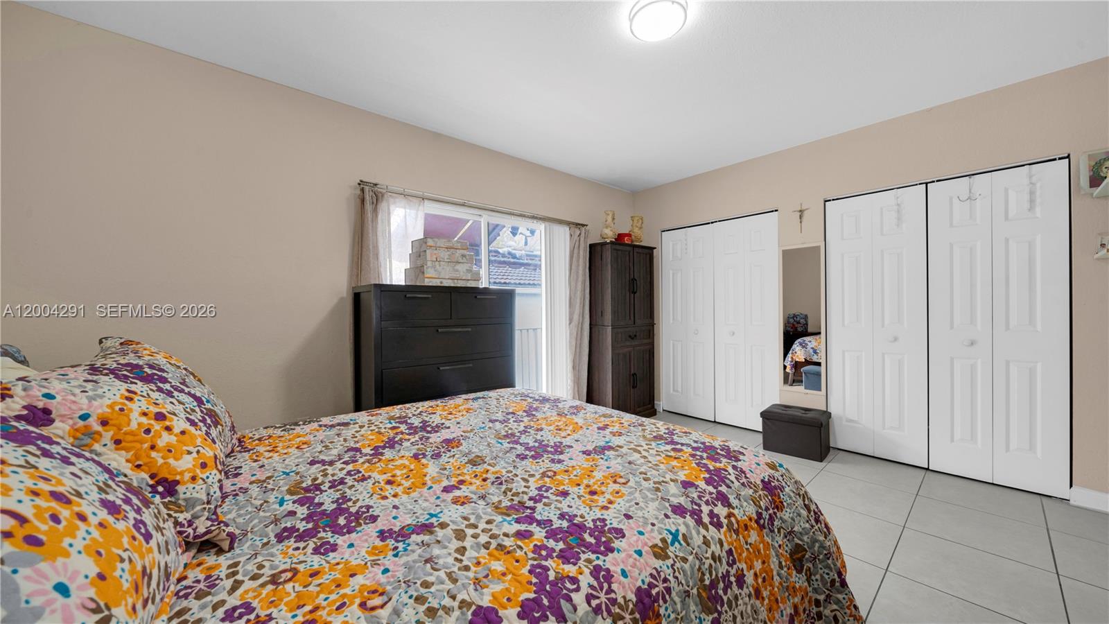 120 East 5th Street, Unit 2 Hialeah, FL 33010 - Photo 33 of 42 a bedroom with a bed and a dresser