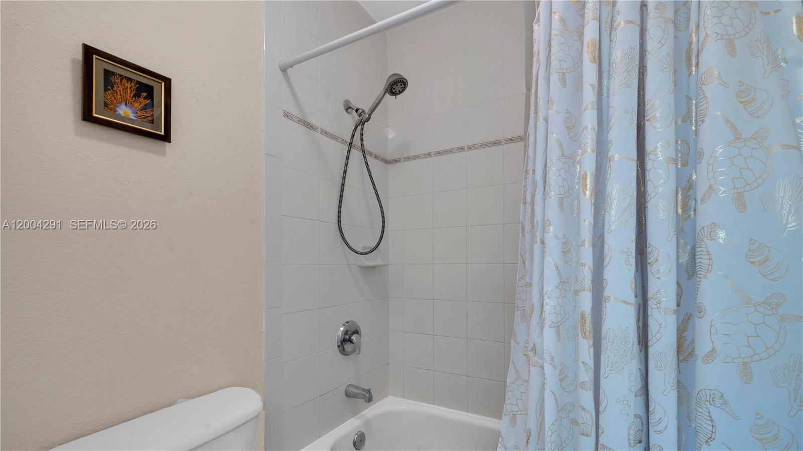 120 East 5th Street, Unit 2 Hialeah, FL 33010 - Photo 35 of 42 a bathroom with a shower and a toilet