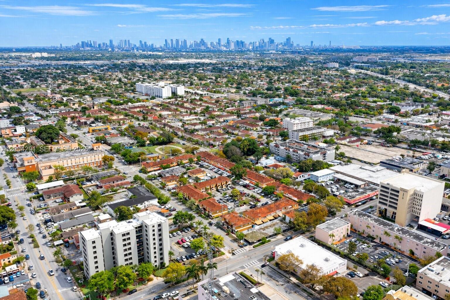 120 East 5th Street, Unit 2 Hialeah, FL 33010 - Photo 37 of 42 an aerial view of residential building with parking