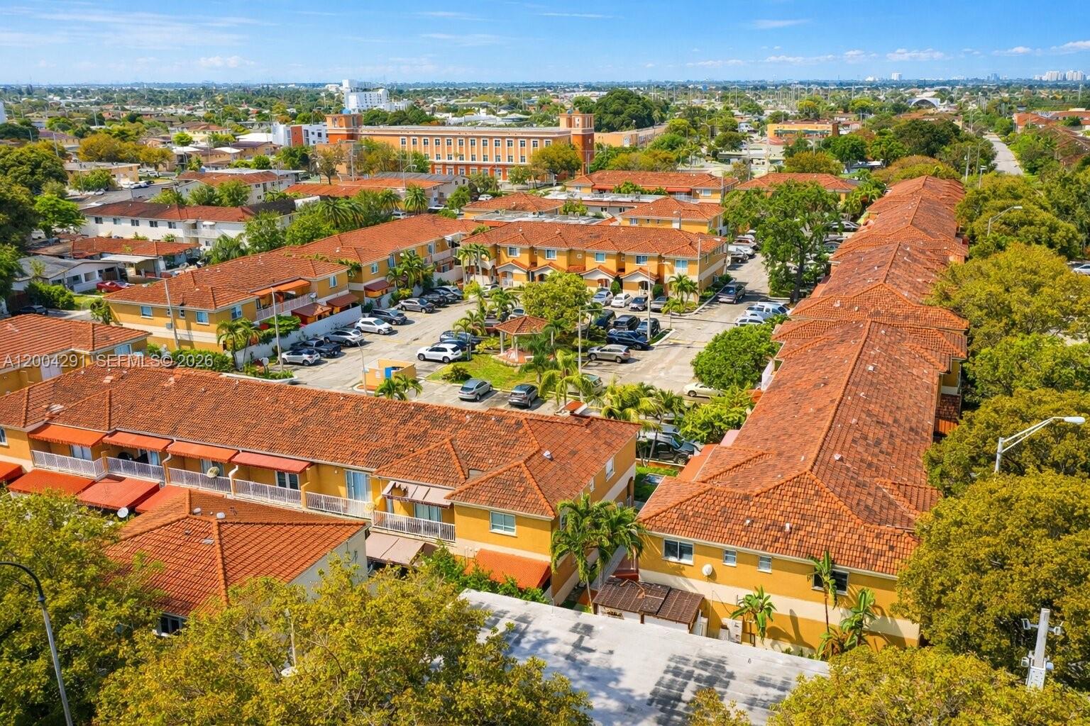 120 East 5th Street, Unit 2 Hialeah, FL 33010 - Photo 38 of 42 an aerial view of residential houses with outdoor space