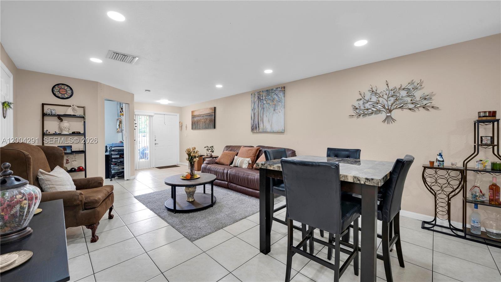 120 East 5th Street, Unit 2 Hialeah, FL 33010 - Photo 10 of 42 a view of a dining room with furniture