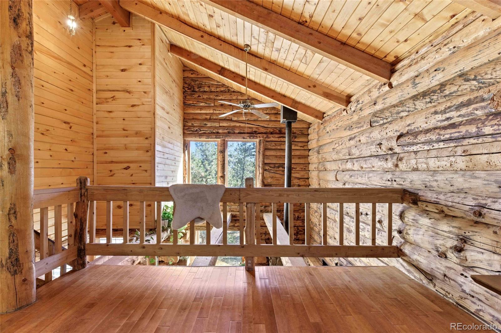 310 Holmes Gulch Road Bailey, CO 80421 - Photo 18 of 48 a front view of a building