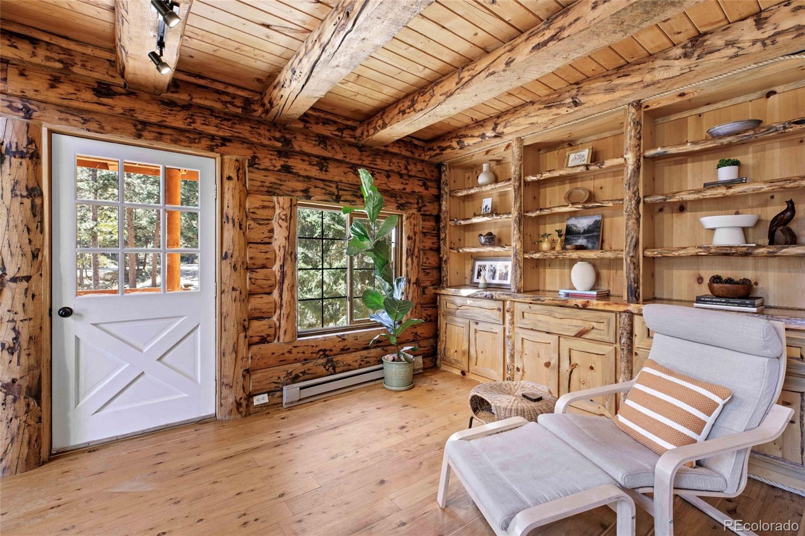 310 Holmes Gulch Road Bailey, CO 80421 - Photo 7 of 48 a room with storage and utility