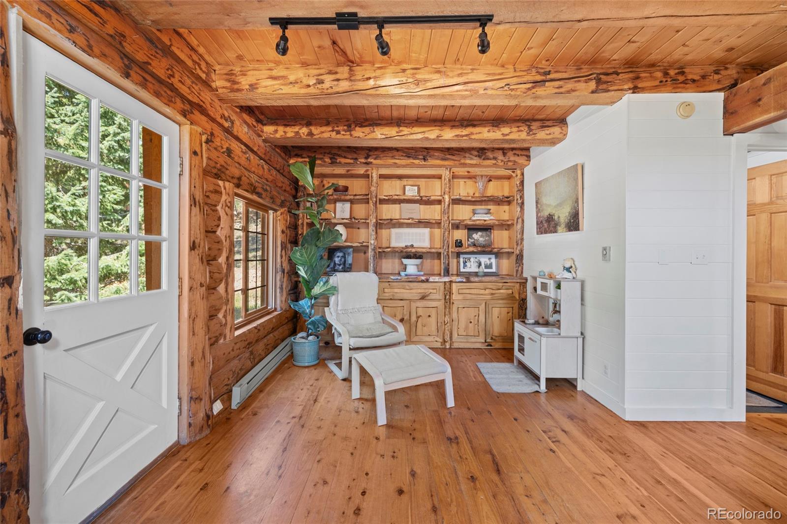 310 Holmes Gulch Road Bailey, CO 80421 - Photo 8 of 48 a view of a chairs in a room