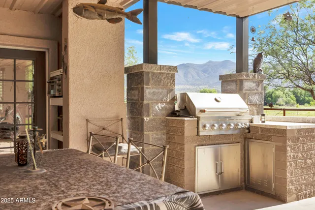 a view of balcony with furniture