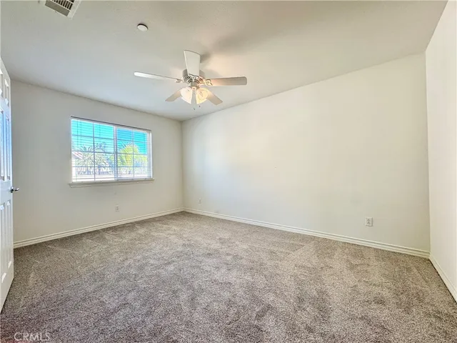 a living room with a couch and a table