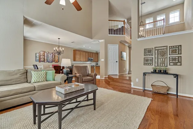 a living room with furniture and a table