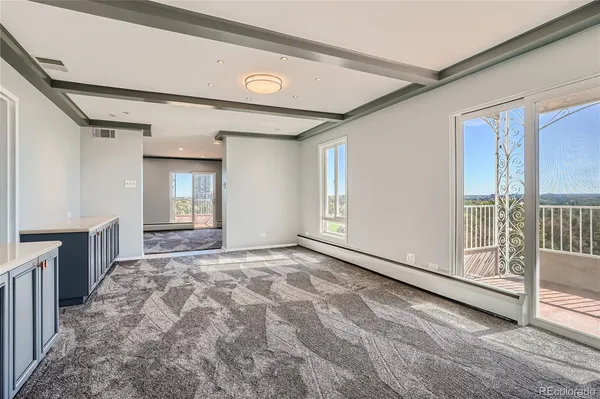 a view of an empty room and window
