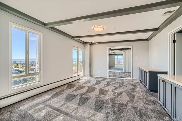 a view of an empty room and window