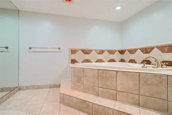 a bathroom with a shower and a sink