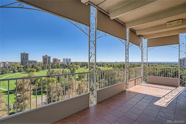 a view of a balcony with city view