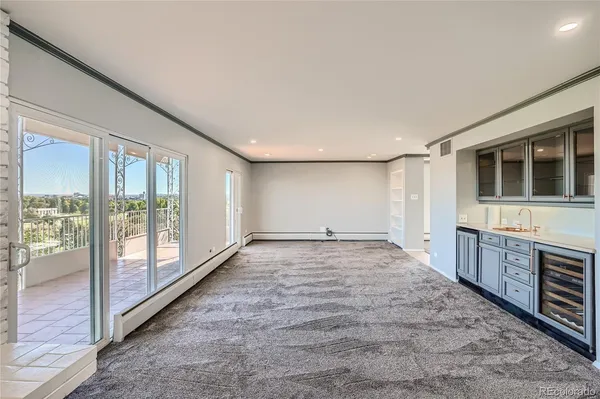 a view of an empty room and window