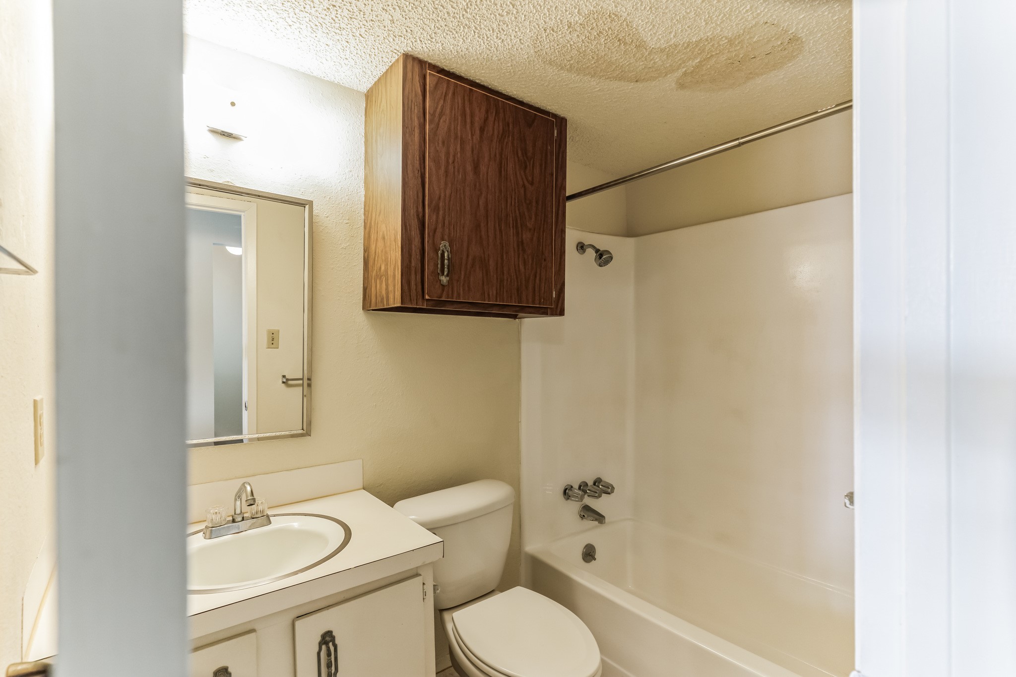 630 Maiden Lane, Unit K Austin, TX 78705 - Photo 12 of 15 a bathroom with a sink toilet and shower