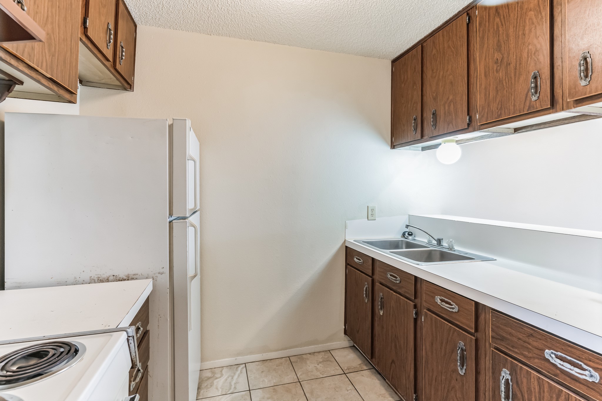 630 Maiden Lane, Unit K Austin, TX 78705 - Photo 13 of 15 a utility room with sink dryer and washer