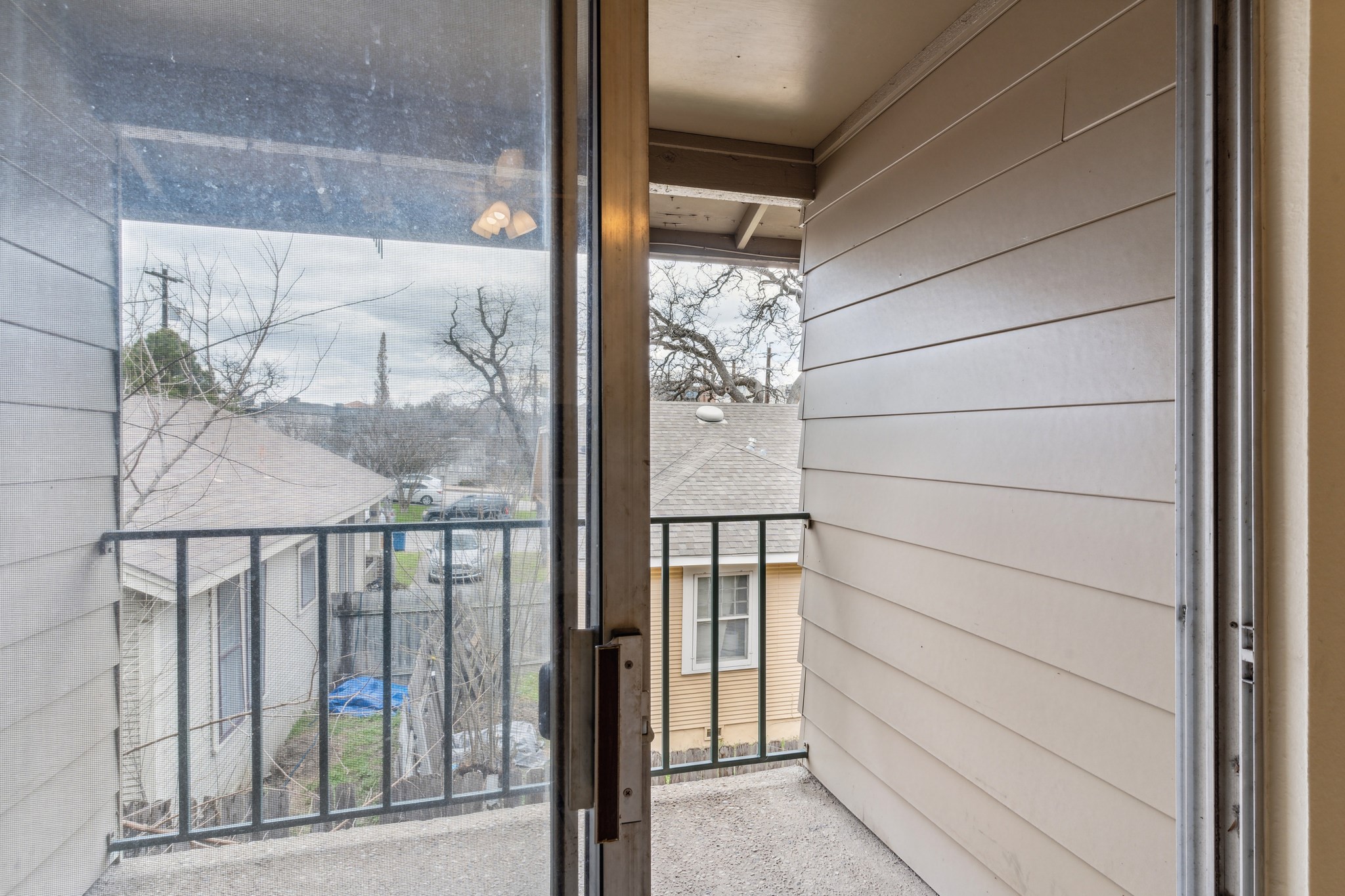 630 Maiden Lane, Unit K Austin, TX 78705 - Photo 5 of 15 a view of a glass door of a house