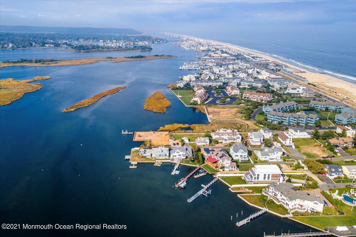 15 Riverview Road Monmouth Beach, NJ 07750 - Photo 13 of 38 an aerial view of residential houses with outdoor space