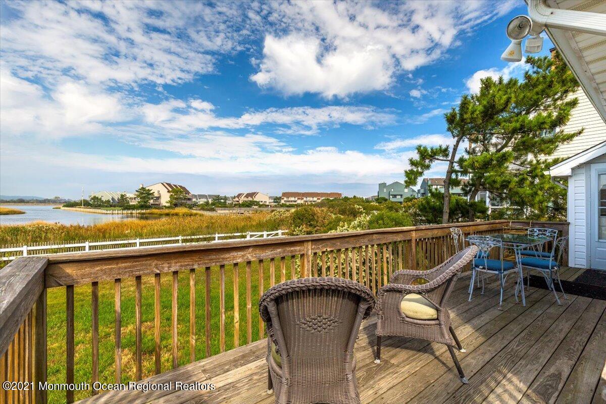 15 Riverview Road Monmouth Beach, NJ 07750 - Photo 20 of 38 a view of a balcony with wooden floor and city view