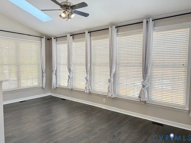 a kitchen with stainless steel appliances a white stove top oven sink and cabinets