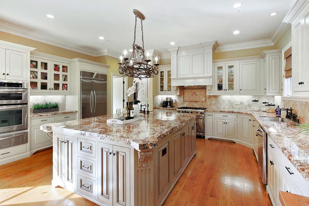 150 Newton Drive Burlingame, CA 94010 - Photo 15 of 58 a kitchen with stainless steel appliances granite countertop a sink stove and refrigerator