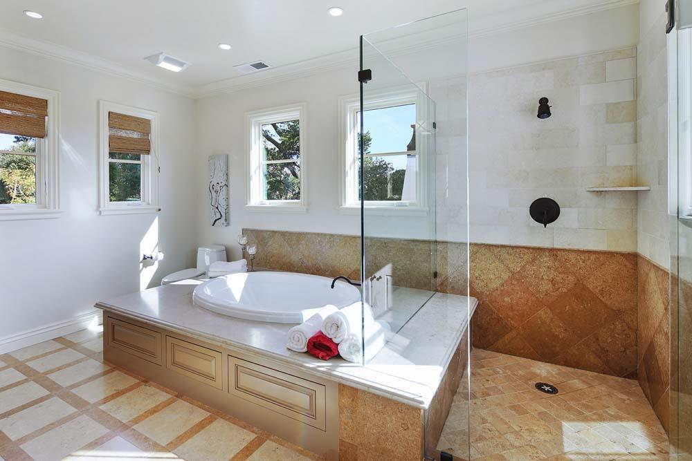 150 Newton Drive Burlingame, CA 94010 - Photo 33 of 58 a bath room with a bath tub and a shower