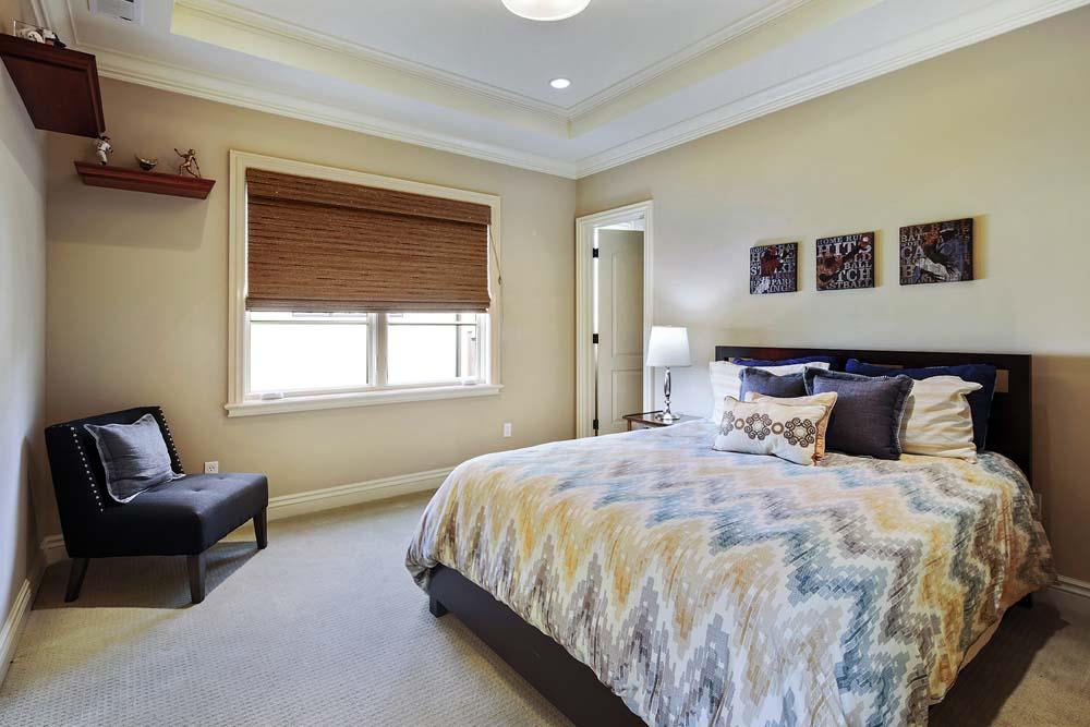 150 Newton Drive Burlingame, CA 94010 - Photo 39 of 58 a bedroom with bed and window