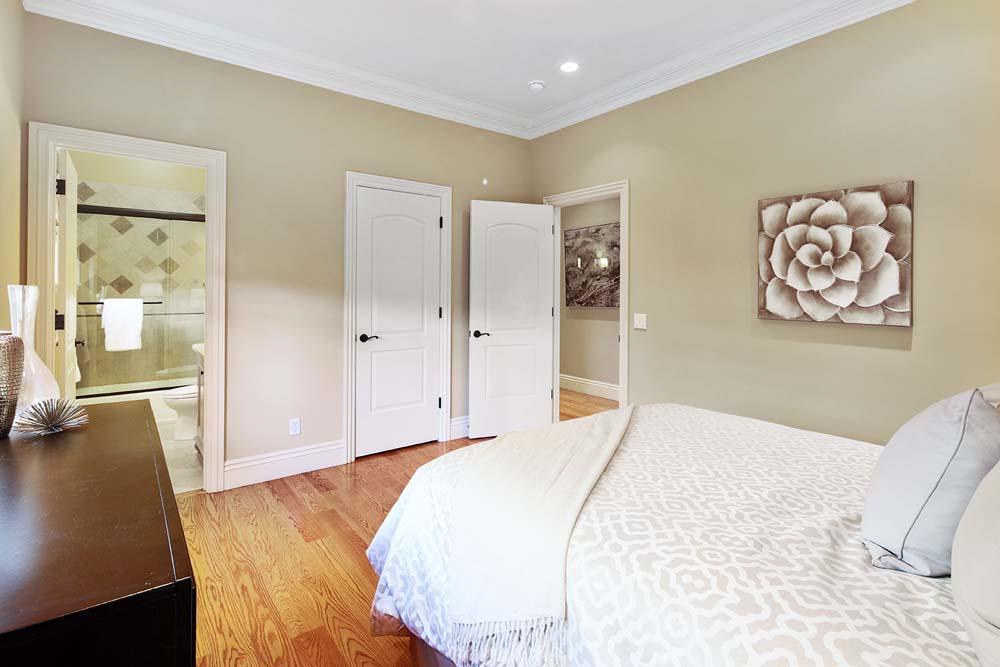150 Newton Drive Burlingame, CA 94010 - Photo 43 of 58 a bedroom with a bed and painting on the wall