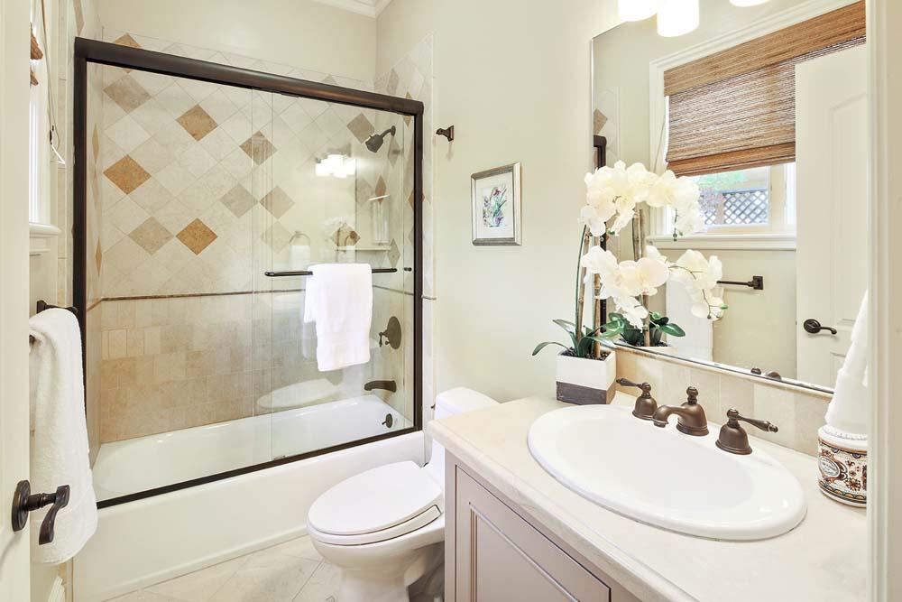 150 Newton Drive Burlingame, CA 94010 - Photo 44 of 58 a bathroom with a sink toilet and shower