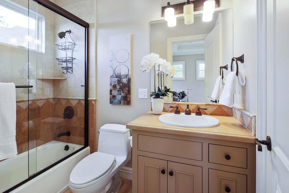 150 Newton Drive Burlingame, CA 94010 - Photo 47 of 58 a bathroom with a sink a toilet and shower