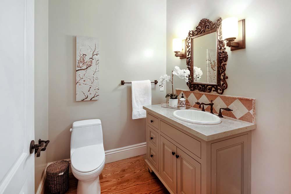 150 Newton Drive Burlingame, CA 94010 - Photo 49 of 58 a bathroom with a sink and a toilet