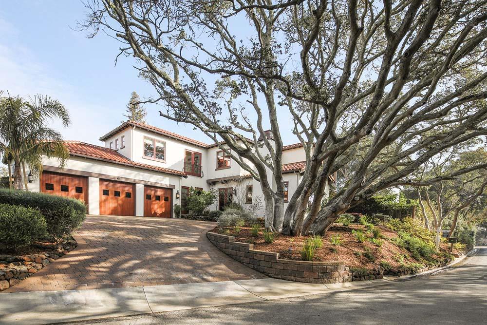 150 Newton Drive Burlingame, CA 94010 - Photo 6 of 58 a view of a white house with a large tree