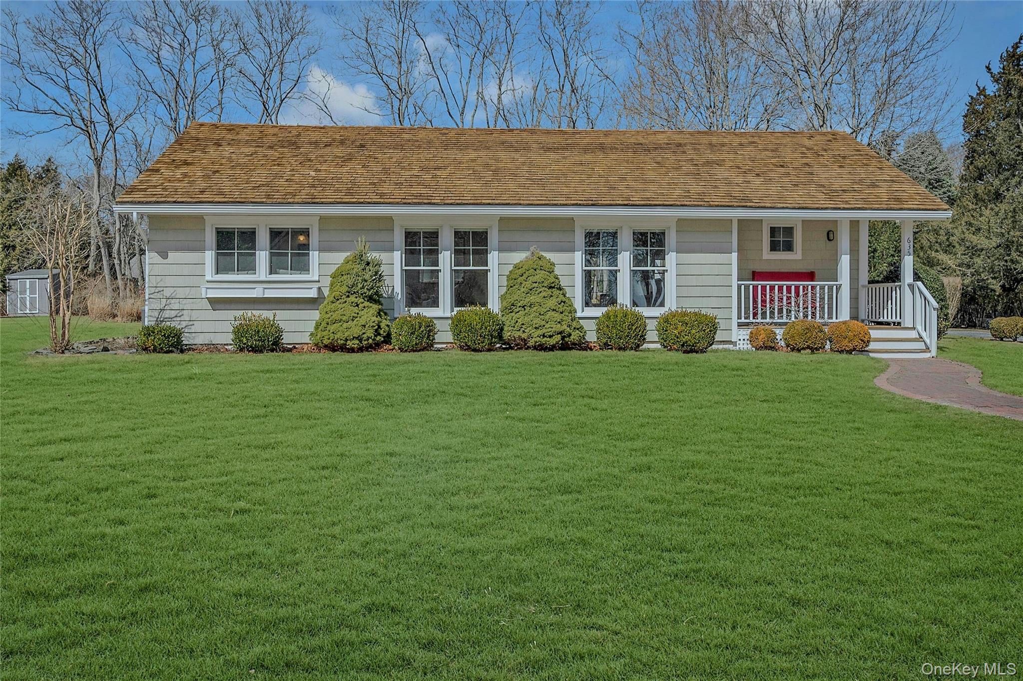 a view of a yard in front of a house