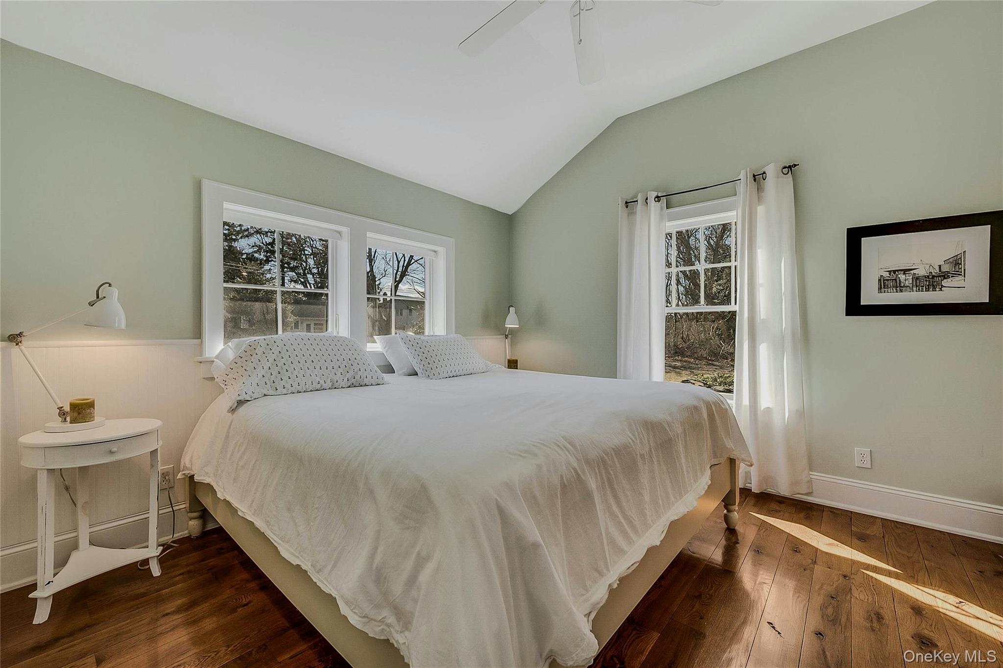 635 Strohson Road Cutchogue, NY 11935 - Photo 18 of 32 a bedroom with a bed and a window