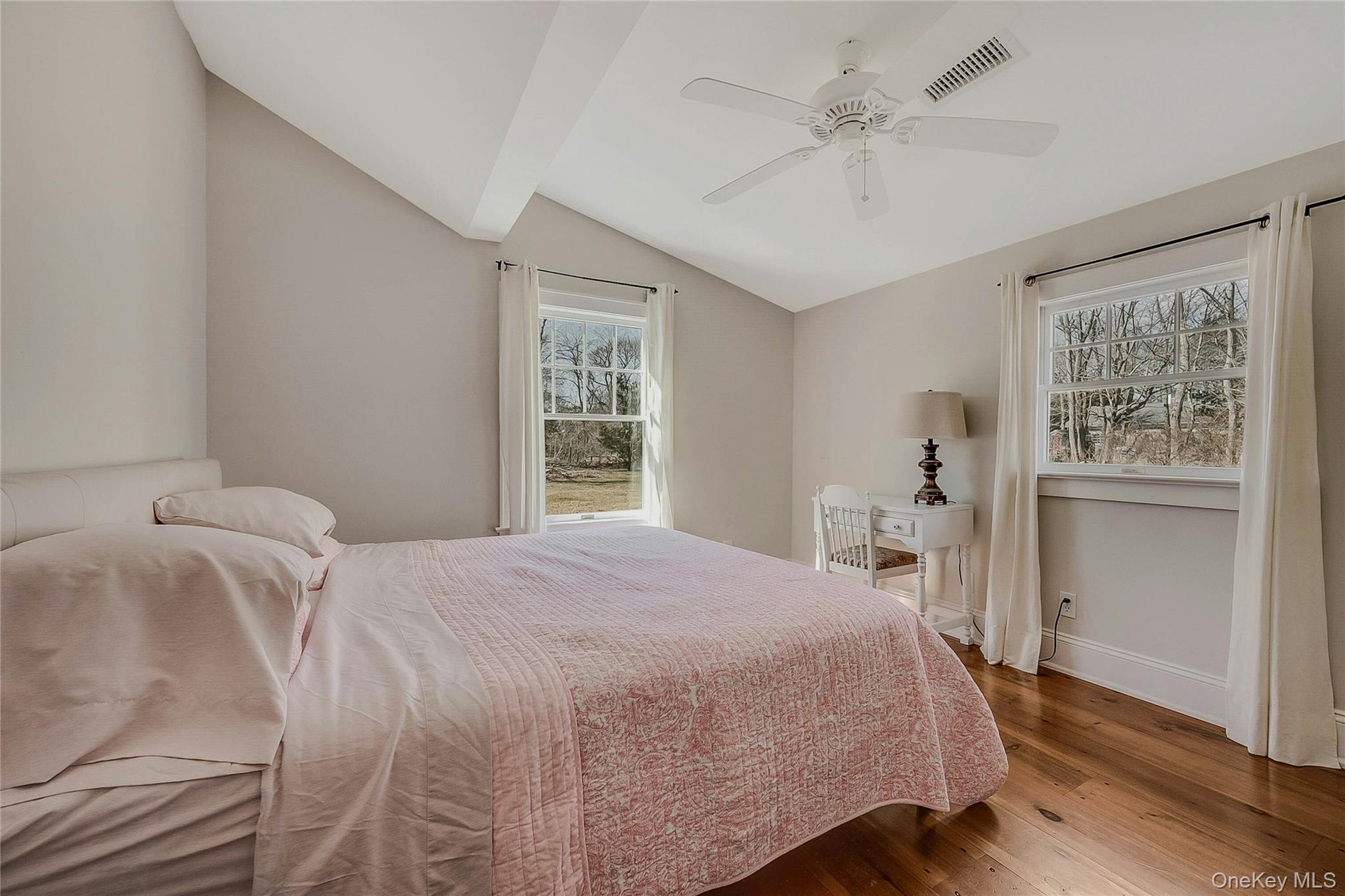 635 Strohson Road Cutchogue, NY 11935 - Photo 20 of 32 a bedroom with a bed and a window