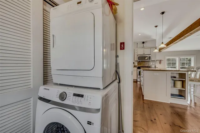 a view of a chairs and bench in the garden