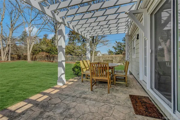 a view of a chairs in a backyard