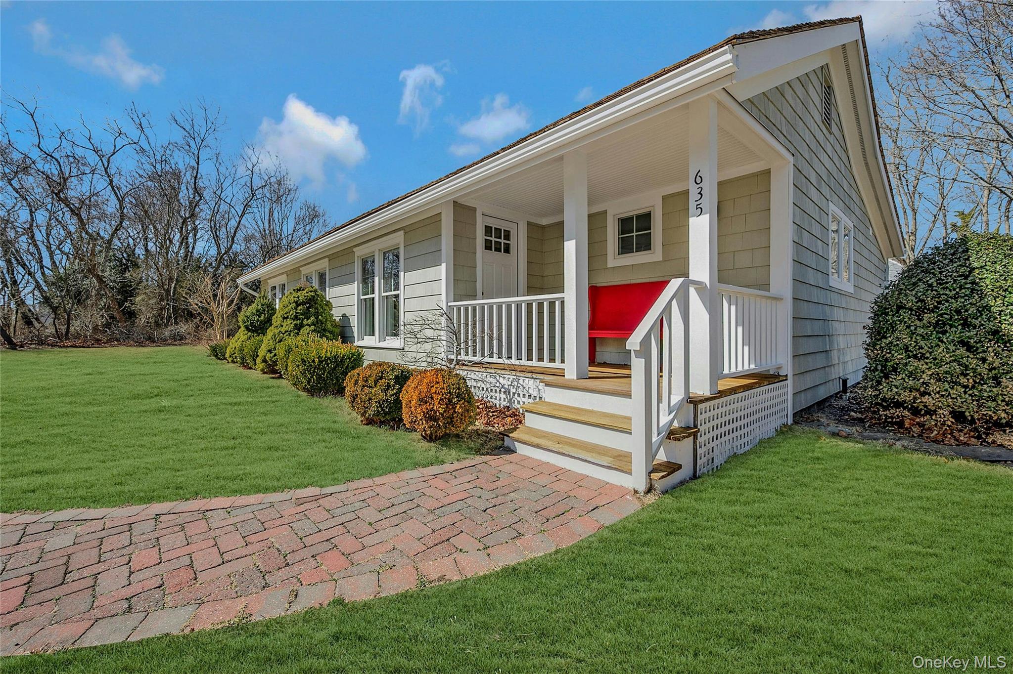 635 Strohson Road Cutchogue, NY 11935 - Photo 3 of 32 a view of house with backyard and porch