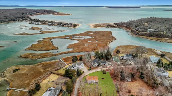 a view of a lake with beach and ocean view