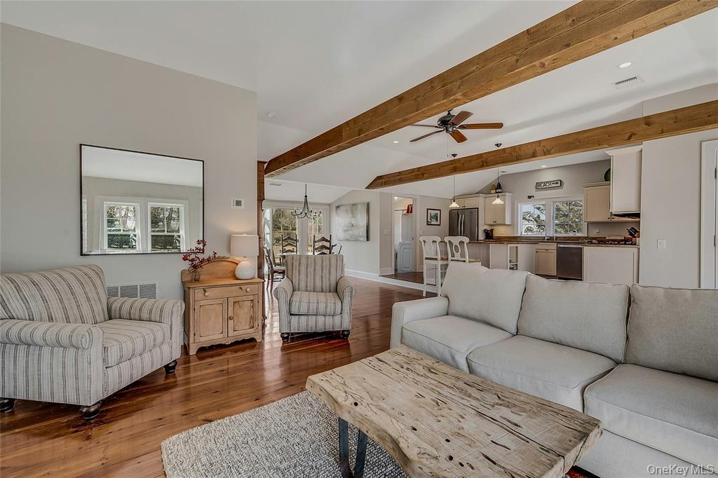 635 Strohson Road Cutchogue, NY 11935 - Photo 6 of 32 a living room with furniture and a wooden floor