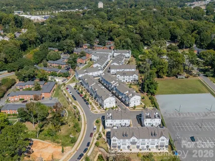 an aerial view of a swimming pool and outdoor space