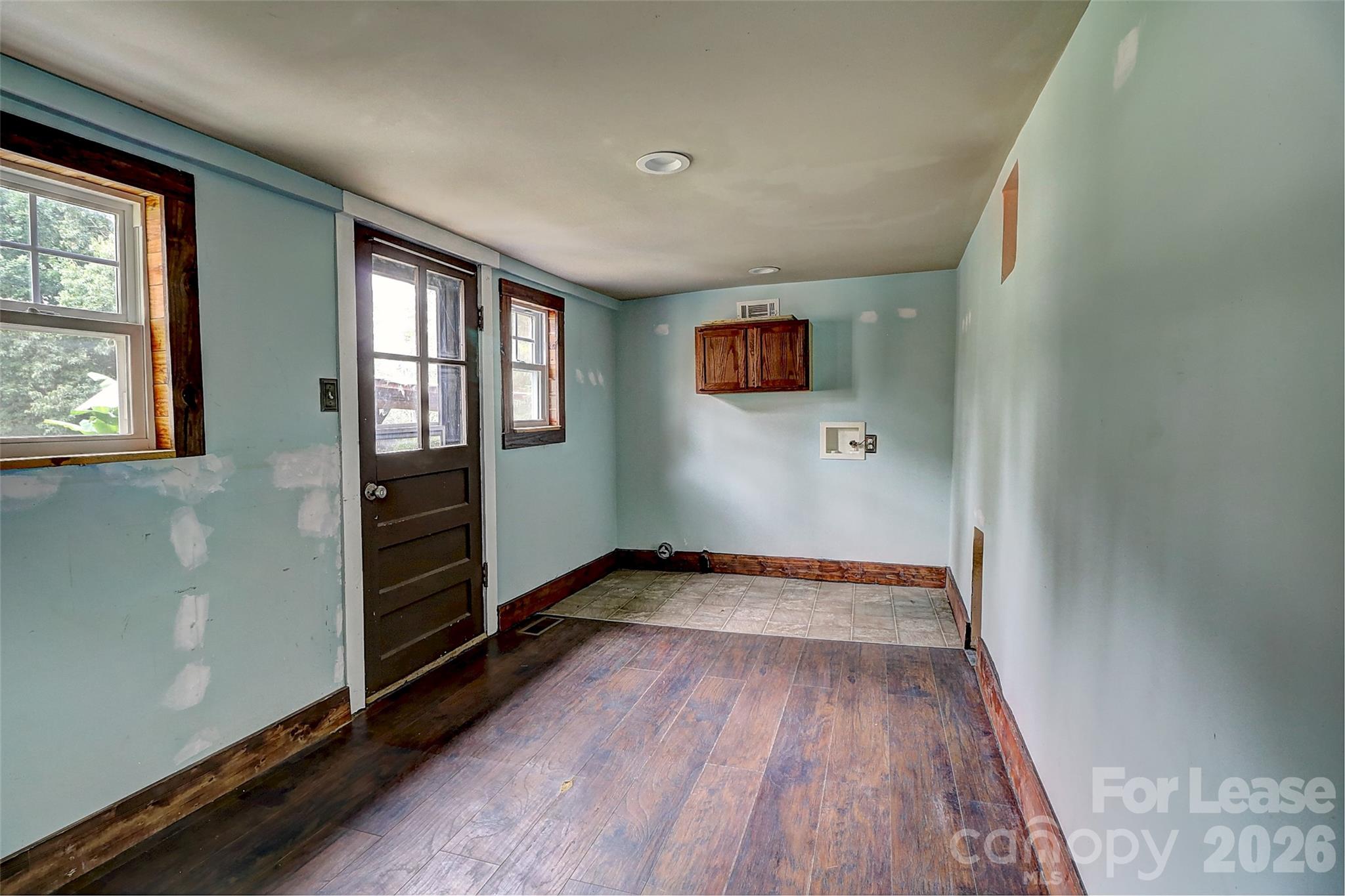 3601 Kidd Lane Charlotte, NC 28216 - Photo 12 of 19 wooden floor in an empty room with a window