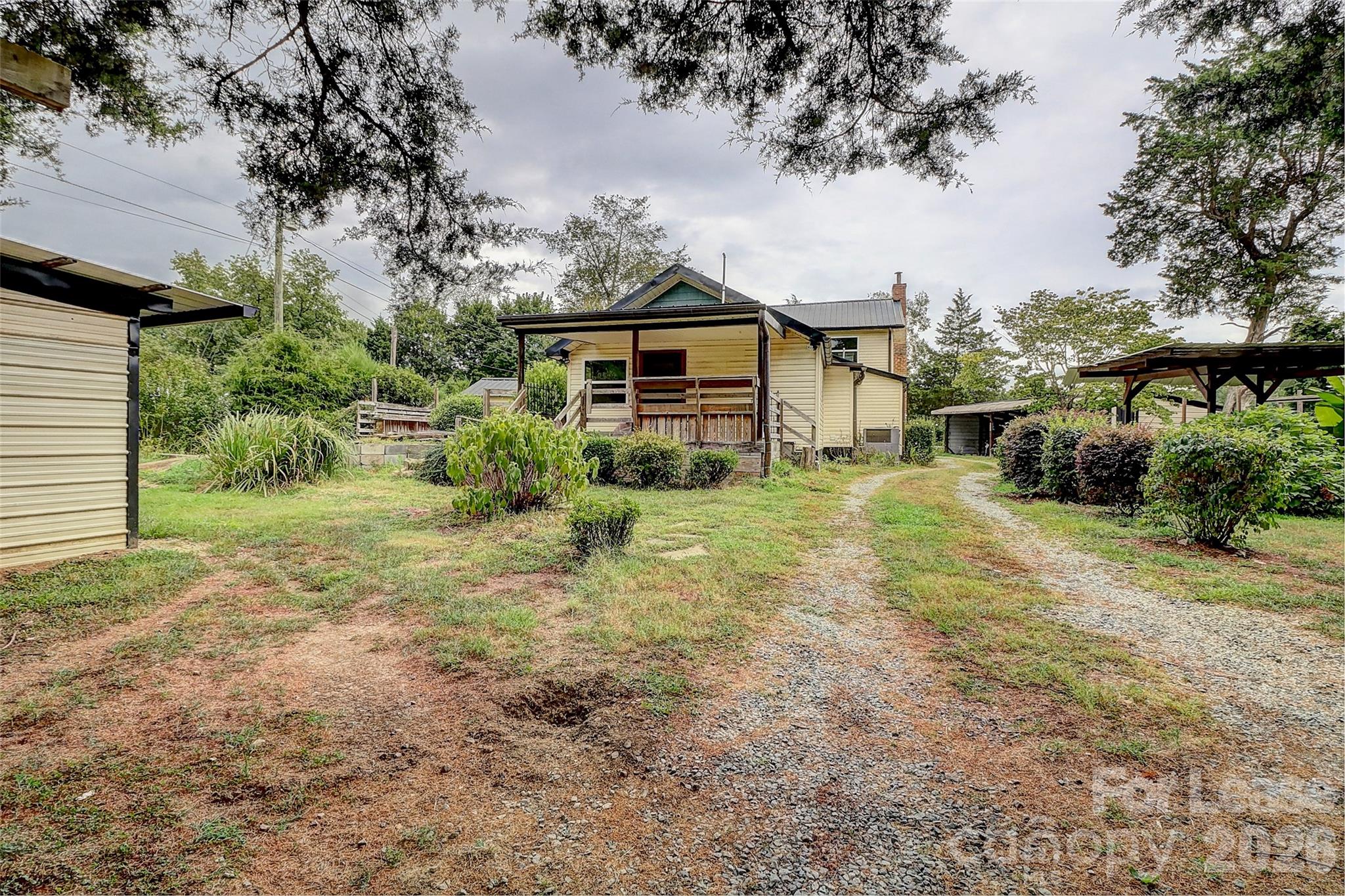 3601 Kidd Lane Charlotte, NC 28216 - Photo 18 of 19 a view of a house with a yard