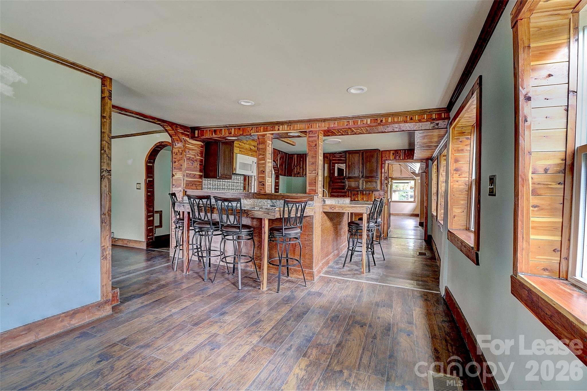 3601 Kidd Lane Charlotte, NC 28216 - Photo 4 of 19 a view of a dining room with furniture and wooden floor