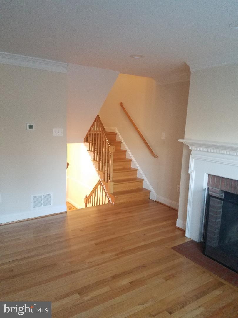 1152 Wimbledon Drive McLean, VA 22101 - Photo 12 of 37 a view of entryway and hall with wooden floor