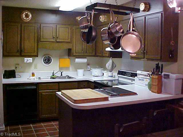 830 Bundaberg Lane Rural Hall, NC 27045 - Photo 5 of 9 Other. Great working kitchen even has a built-in grill perfect for preparing breakfast or dinner.