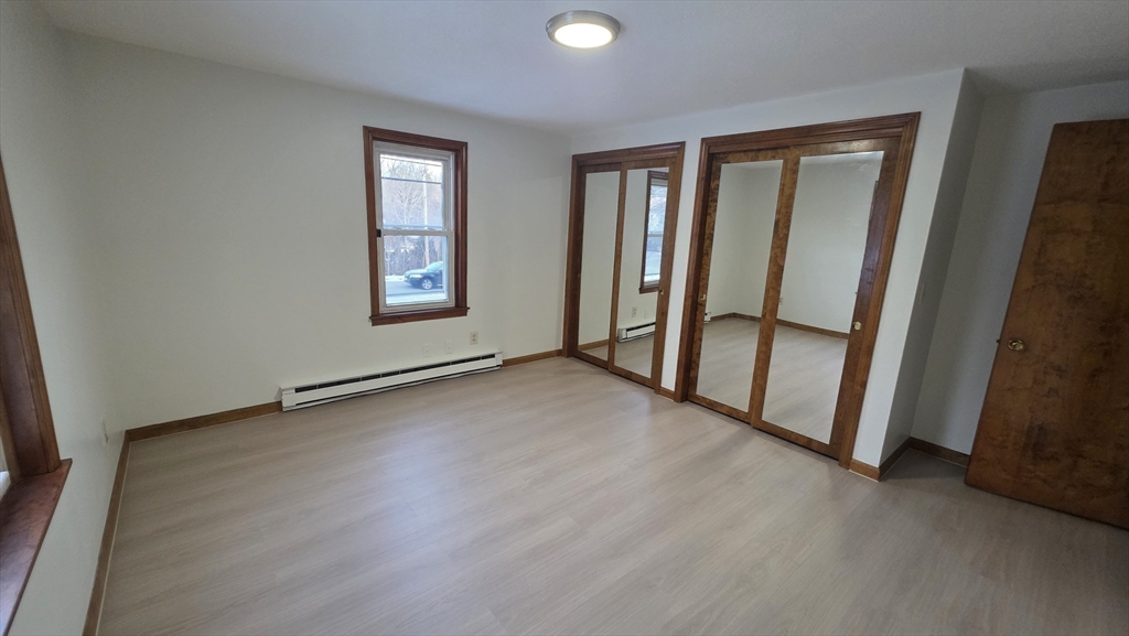 13 East Brookfield Road North Brookfield, MA 01535 - Photo 11 of 28 a view of an empty room with a window